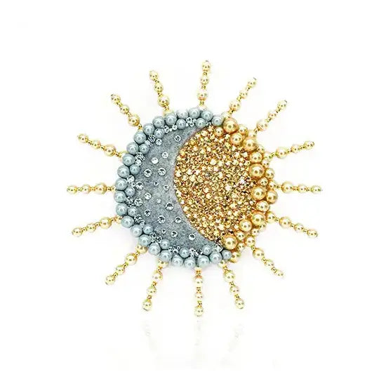 Sun and Moon motif brooch with gold Preciosa pearls and pearlescent grey pearls around the outside and Preciosa Crystals in the centre. 